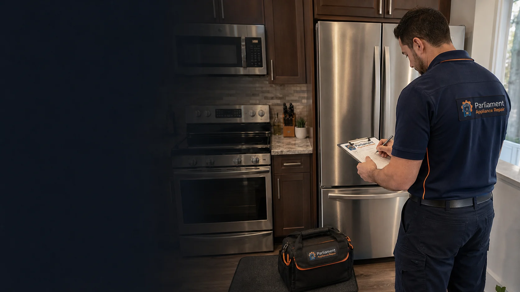 Parliament Appliance Repair technician standing near kitchen appliances in Ottawa